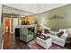 Open concept living room and kitchen with hardwood floors and lots of space at 1714 Indian Way, Cumming, GA 30040