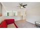 This is the living room loft space. The loft includes carpet and plenty of natural light at 1714 Indian Way, Cumming, GA 30040