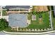 Aerial view of a home with a large, fenced backyard featuring a pergola and trampoline at 400 Silver Spring St, Dallas, GA 30157