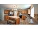 Bright kitchen with wood cabinetry, stainless steel appliances, and a functional island at 400 Silver Spring St, Dallas, GA 30157