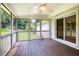 Screened porch with wood floors provides a relaxing space at 4523 Doc Sams Rd, Cumming, GA 30028