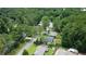Aerial view of neighborhood with tree lined street at 1150 Terramont Dr, Roswell, GA 30076