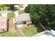 Aerial view of home featuring a fenced backyard, patio, mature trees, and a long driveway at 1150 Terramont Dr, Roswell, GA 30076