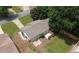 Aerial view of home featuring a fenced backyard, patio, mature trees, and a long driveway at 1150 Terramont Dr, Roswell, GA 30076