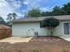 Cozy backyard features a patio and a charming, small tree for shade and privacy at 1150 Terramont Dr, Roswell, GA 30076