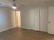 Spacious bedroom with closet and laminate flooring at 1150 Terramont Dr, Roswell, GA 30076