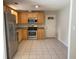Eat-in kitchen featuring stainless steel appliances and tile flooring at 1150 Terramont Dr, Roswell, GA 30076