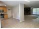 Open concept kitchen featuring stainless steel appliances, wood cabinets, and tiled floors at 1150 Terramont Dr, Roswell, GA 30076