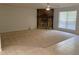 Spacious living room featuring a stone fireplace at 1150 Terramont Dr, Roswell, GA 30076
