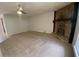 Bright living room featuring a stone fireplace and neutral carpeting at 1150 Terramont Dr, Roswell, GA 30076