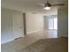 Open-concept living room boasting tile floors and a sliding glass door to the outside at 1150 Terramont Dr, Roswell, GA 30076