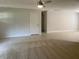Bright living room showcasing tile flooring and neutral-colored walls at 1150 Terramont Dr, Roswell, GA 30076