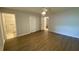 Comfortable primary bedroom with wood floors, a ceiling fan and an ensuite bathroom at 1150 Terramont Dr, Roswell, GA 30076