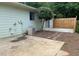 View of the back patio with fenced in yard and sliding glass doors at 1150 Terramont Dr, Roswell, GA 30076