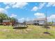 Large backyard with a trampoline, swing set, and shed, providing ample space for outdoor fun and storage at 36 Ivy Chase Loop, Dallas, GA 30157