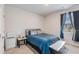 Cozy bedroom with ample natural light from window and a comfortable atmosphere, ideal for relaxation at 36 Ivy Chase Loop, Dallas, GA 30157