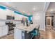 Spacious kitchen with granite countertops, stainless appliances, white cabinets, and wood-look flooring at 36 Ivy Chase Loop, Dallas, GA 30157