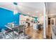 Eat-in kitchen featuring stainless steel appliances, an island with bar seating, and wood flooring at 36 Ivy Chase Loop, Dallas, GA 30157