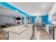 Open-concept kitchen overlooking the living room featuring granite countertops and stainless steel appliances at 36 Ivy Chase Loop, Dallas, GA 30157