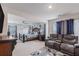 Spacious main bedroom suite with sitting area, plush carpet, and natural lighting at 36 Ivy Chase Loop, Dallas, GA 30157