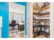 Spacious walk-in pantry featuring open shelving and a view into the adjacent office space at 36 Ivy Chase Loop, Dallas, GA 30157