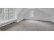 Large bedroom featuring neutral carpet, built-in window seating and natural light at 63 Lakeview Ln, Stockbridge, GA 30281