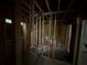 Framed new bathroom space with exposed beams and plumbing ready for construction, offering customization at 1106 Donnelly Sw Ave, Atlanta, GA 30310