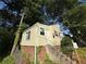 Charming one-story home with a sidewalk and short stairway leading to an inviting front entrance at 1106 Donnelly Sw Ave, Atlanta, GA 30310