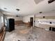Spacious living room displaying demoed walls and wood flooring ready for renovation with natural light at 1106 Donnelly Sw Ave, Atlanta, GA 30310