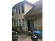 A secluded patio area, ideal for outdoor gatherings and relaxation, with ample seating and grill at 1697 Preserve Park Dr, Loganville, GA 30052