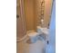 Small bathroom with pedestal sink, toilet, and glass enclosed shower at 1988 Greensferry Gln, Lawrenceville, GA 30043