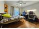 Bedroom featuring a bed and desk at 1988 Greensferry Gln, Lawrenceville, GA 30043