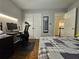 Bedroom featuring desk and closet space at 1988 Greensferry Gln, Lawrenceville, GA 30043