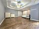 Spacious main bedroom with hardwood floors, trey ceiling, and two large dressers at 1988 Greensferry Gln, Lawrenceville, GA 30043