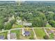 Stunning aerial view of the house on 2243 Cain Circle, Dacula, GA 30019 with a luscious green landscape at 2243 Cain Cir, Dacula, GA 30019