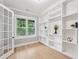 Bright office with custom built-in shelving and a large window at 2243 Cain Cir, Dacula, GA 30019
