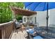 Spacious outdoor deck with dining and lounge areas with wooded views, ideal for outdoor living at 4522 Reva Ne Ct, Marietta, GA 30066