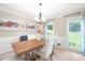 Elegant dining room with modern chandelier and neutral color palette at 4522 Reva Ne Ct, Marietta, GA 30066