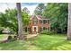Charming brick two-story home with a well-manicured lawn and inviting front entrance at 4522 Reva Ne Ct, Marietta, GA 30066