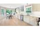 Bright kitchen with stainless steel appliances and an adjacent dining area at 4522 Reva Ne Ct, Marietta, GA 30066