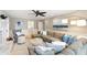 Inviting living room with a cozy fireplace, stylish decor, and lots of natural light at 4522 Reva Ne Ct, Marietta, GA 30066