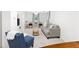 Spacious living room offering a comfortable seating area and a versatile workspace with ample natural light at 4522 Reva Ne Ct, Marietta, GA 30066