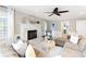 Inviting living room features a cozy fireplace and comfortable seating with natural light at 4522 Reva Ne Ct, Marietta, GA 30066