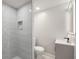 Modern bathroom featuring a walk-in shower, updated fixtures, and contemporary design elements at 900 Ira Sw St, Atlanta, GA 30310