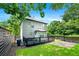Charming backyard featuring a deck and horizontal fence creating a cozy and private outdoor space at 900 Ira Sw St, Atlanta, GA 30310