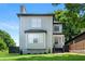 Charming two-story home with gray siding, black trim, and a well-manicured lawn in a desirable neighborhood at 900 Ira Sw St, Atlanta, GA 30310