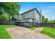 Two-story home featuring an outdoor deck and a fenced yard, creating an inviting outdoor living space at 900 Ira Sw St, Atlanta, GA 30310
