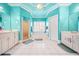 Bright primary bathroom with shower and tub, dual vanities, and custom cabinet space at 1561 Annapolis Way, Grayson, GA 30017