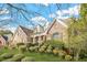 Beautiful two-story house with lush green landscaping in the front yard at 1561 Annapolis Way, Grayson, GA 30017