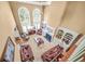 Aerial view of living room with tall ceilings and arch windows providing ample natural light at 1561 Annapolis Way, Grayson, GA 30017
